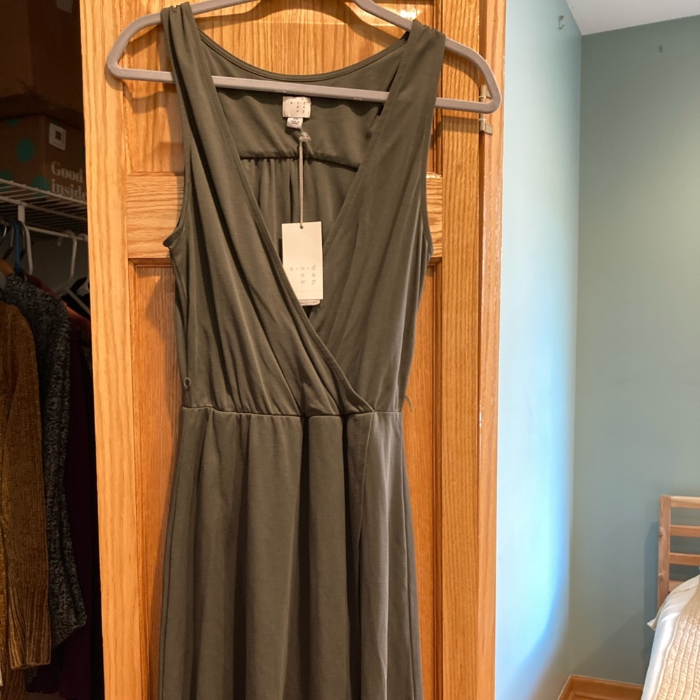 Olive dress to about knee length.